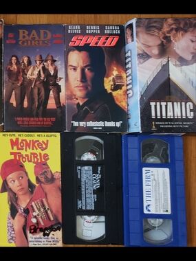 Assorted VHS Movie Tapes - Mixed Colors